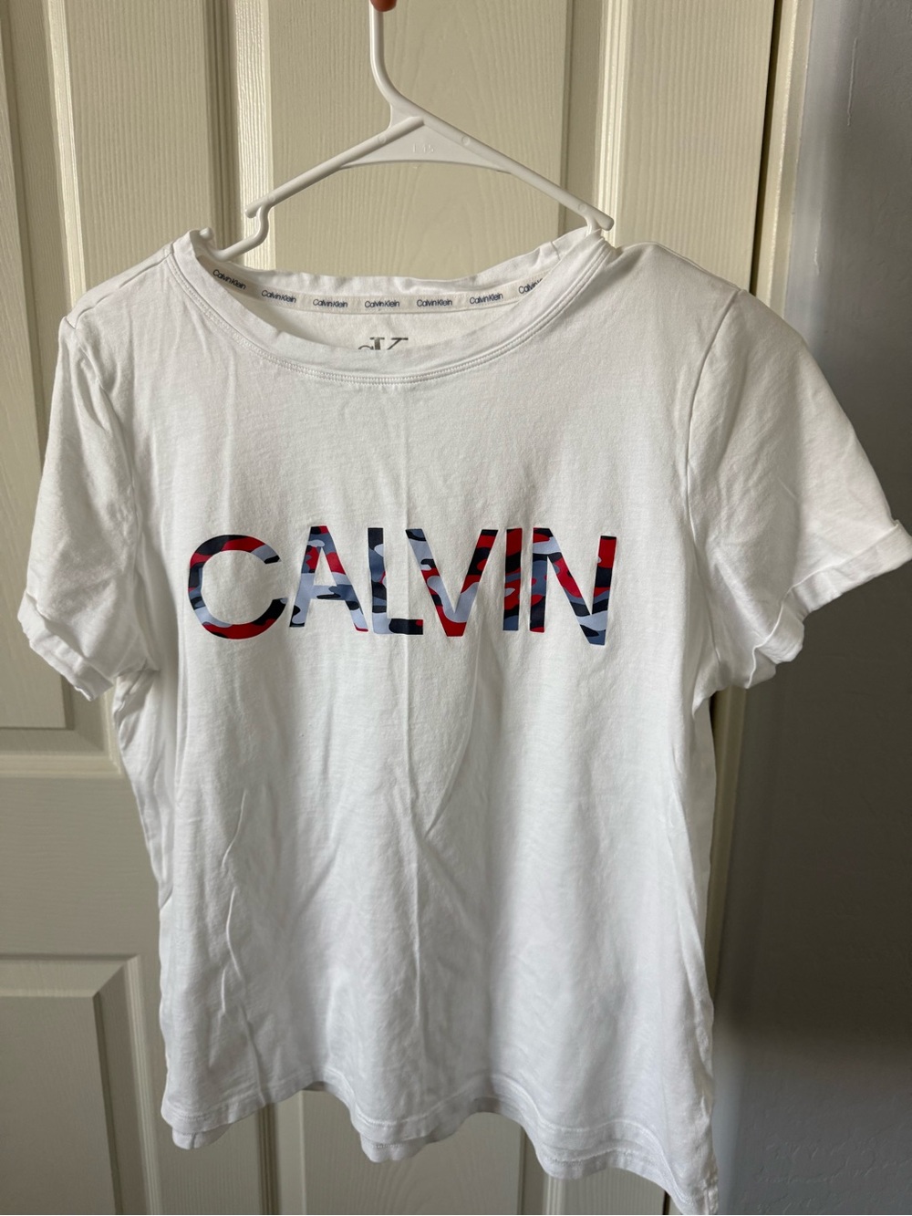 Calvin Klein White Tee with Red & Blue Patterned Logo